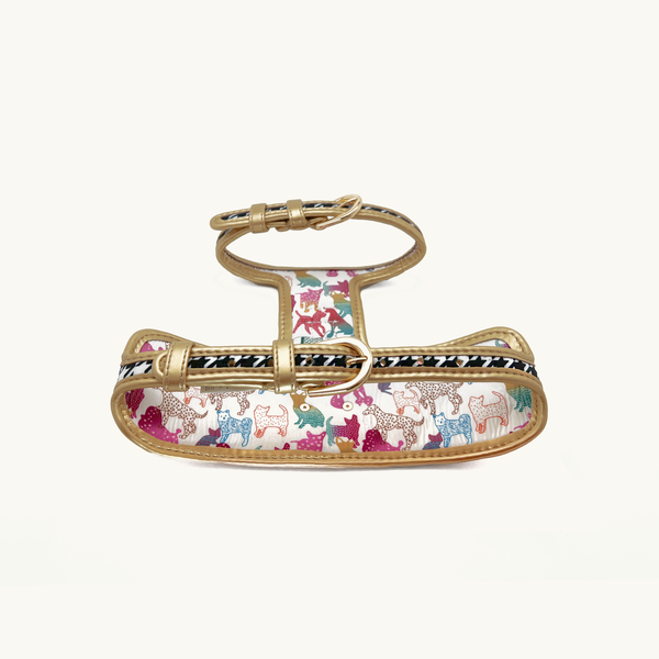 Rear of houndstooth Dog harness with colorful animal pattern and gold buckles