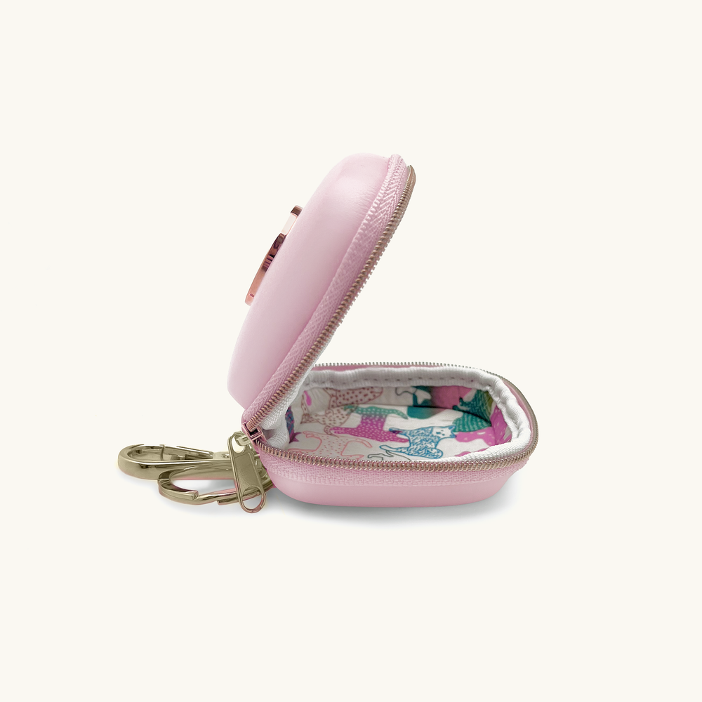 Baby pink dog waste/treat bag with gold logo and keychain