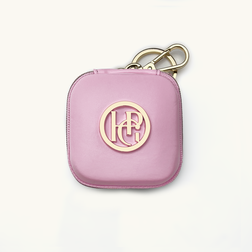 Light pink waste/treat bag with gold accents