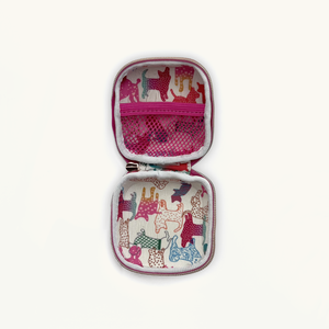Scarlet waste/treat bag open with colorful animal pattern 