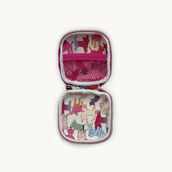 Scarlet waste/treat bag open with colorful animal pattern 